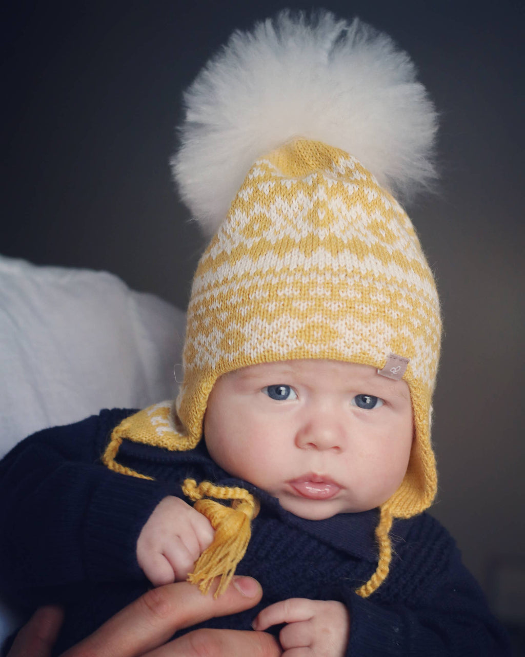 Alpakka Baby Lue med Øreklaffer