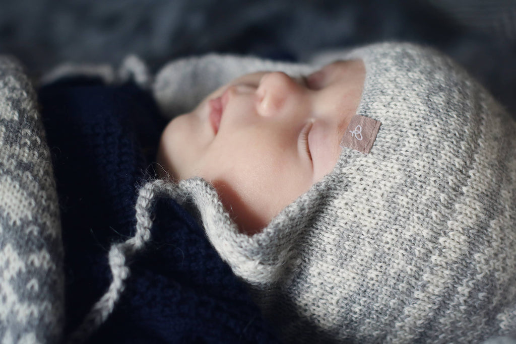 Alpakka Baby Lue med Øreklaffer