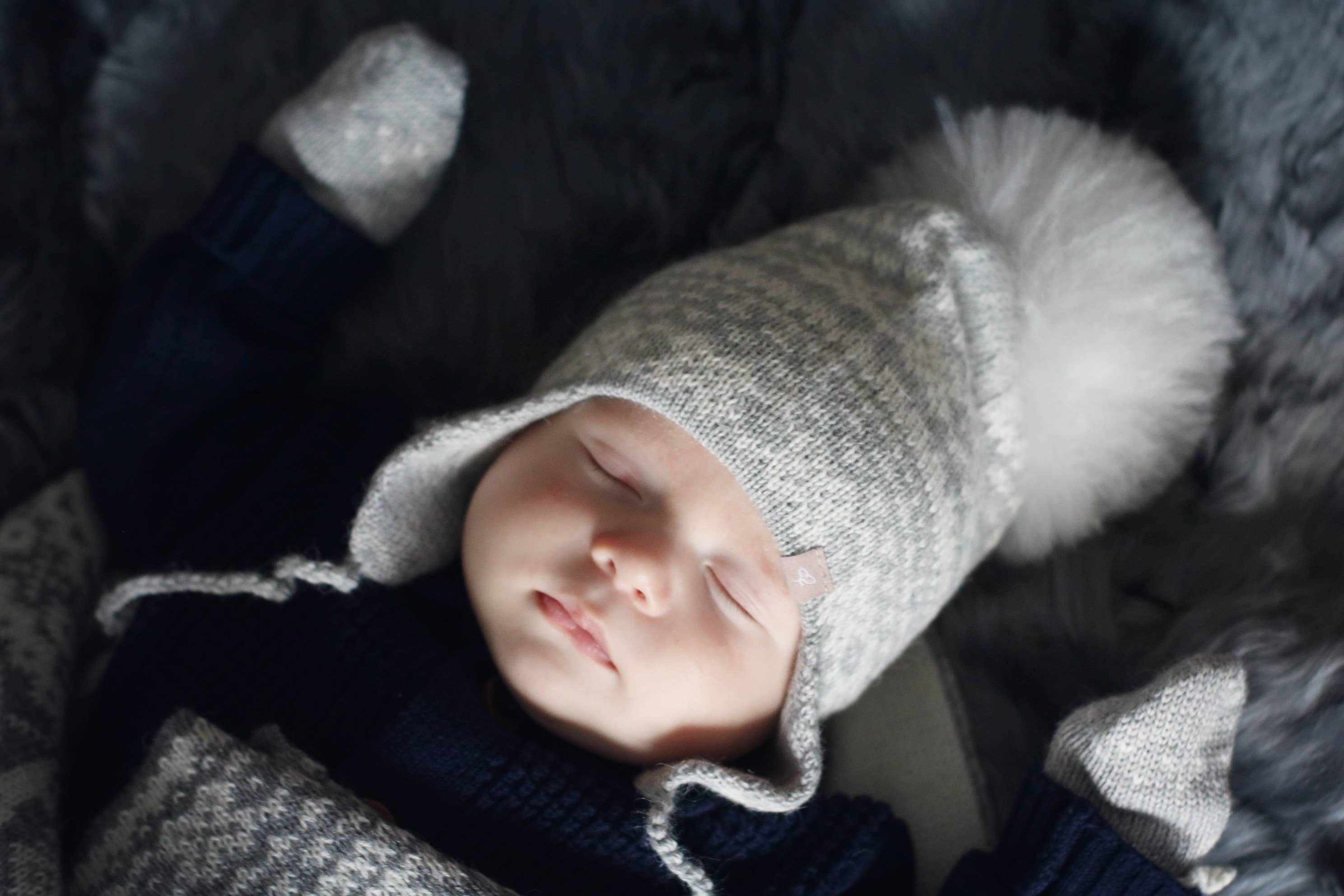 Alpakka Baby Lue med Øreklaffer
