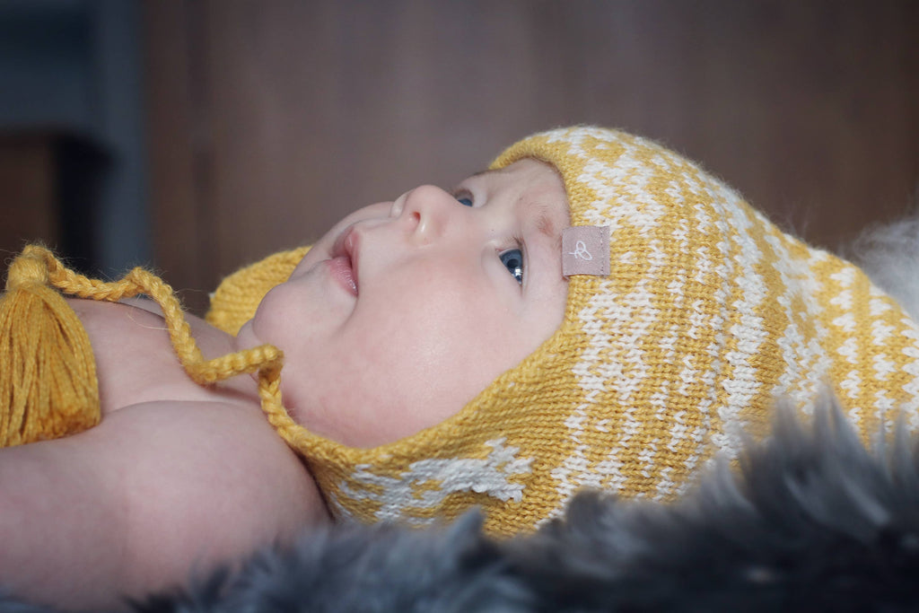 Alpakka Baby Lue med Øreklaffer